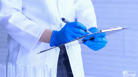 scientist with clipboard