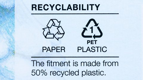 Close-up of recycling information on plastic packaging