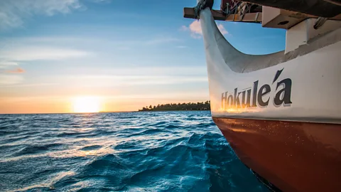 The name Hōkūle‘a painted on the hull of the Polynesian double-hulled sailing canoe