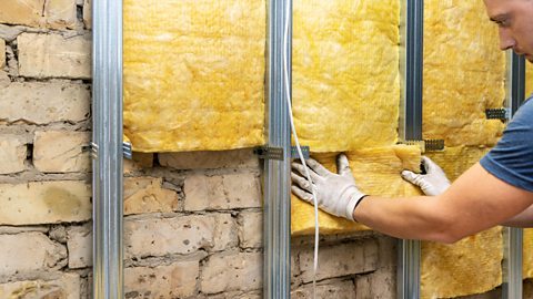 Glass insulation being installed in a property