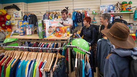 People in a charity shop