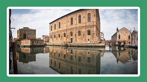 A deserted canal with clean water in Venice, Italy in 2020