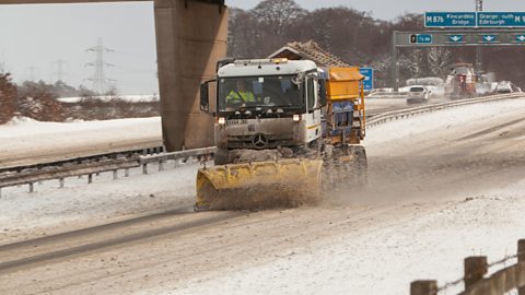 Snowplough on a motorway 