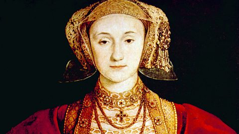 A portrait of Anne of Cleves, who is wearing a gold headdress.