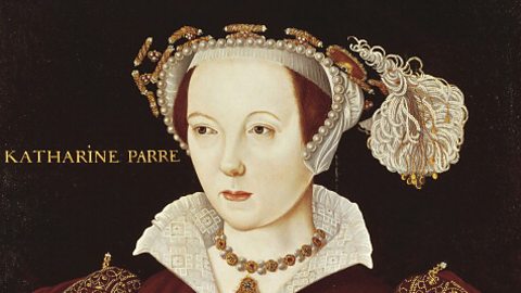 A portrait of Catherine Parr, who is wearing a headdress trimmed with pearls and a gold and pearl necklace.