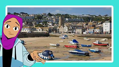 Boats on the shore around the seafront in St Ives