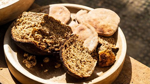 Two types of medieval bread on a plate