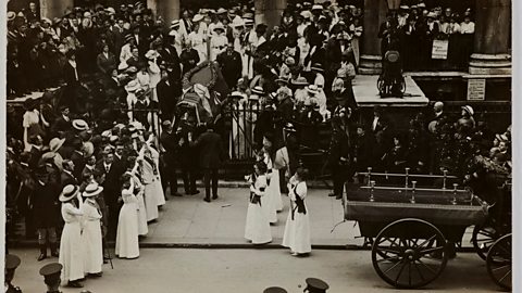 Emily Wilding Davison's coffin being taken into St George's Church in London.