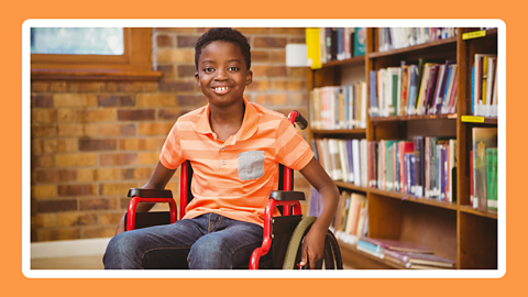 A picture of a boy in a wheelchair.