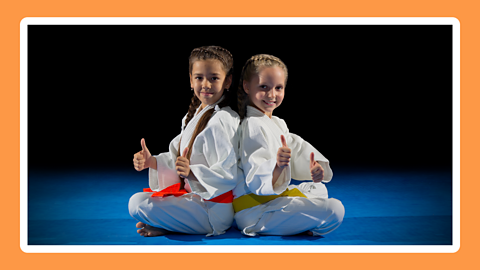 Two children in Judo Gee's