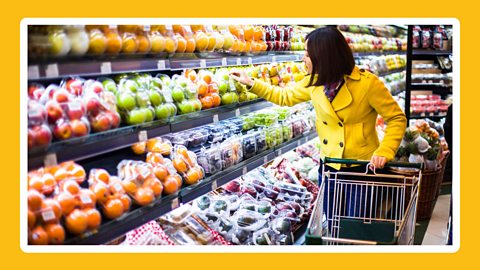 An adult shopping in a supermarket. 