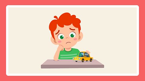 A picture of a boy playing on his own.