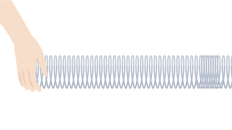 Highlighted compression at the end of the coiled metal spring