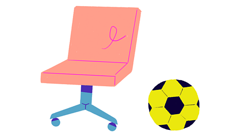 The football is next to the chair