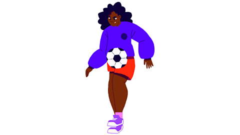 A girl playing football.