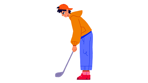 A boy playing golf.