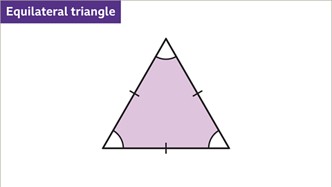 An image of an equilateral triangle. Hatch marks are drawn in the midpoint of each side. Arcs are drawn in each angle. Written above: Equilateral triangle.