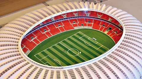 Model of an oval football stadium seen from above