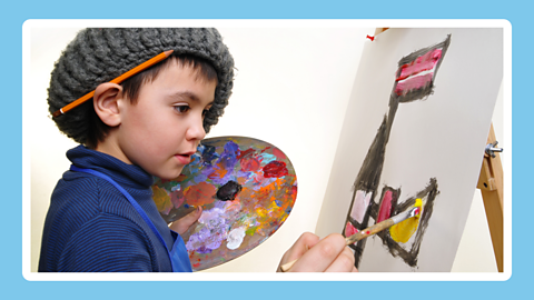 A child painting on a canvas with an easel. 