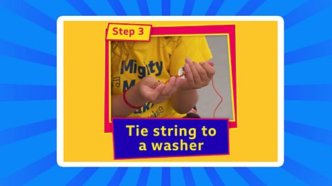 Tying string to a washer.