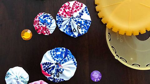 Suffolk puffs and sequins on a table