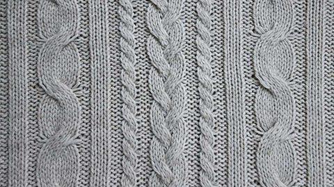 Textured grey knitted fabric