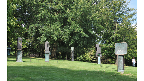 An outdoor display of several of Barbara's sculptures called ‘The Family of Man’ 