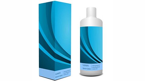 White shampoo bottle with blue label next to blue box 