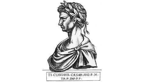 A head and shoulders, profile illustration of Emperor Claudius. He wears a laurel wreath headdress and has fabric draped over his shoulders.