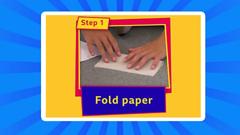 A child folding paper