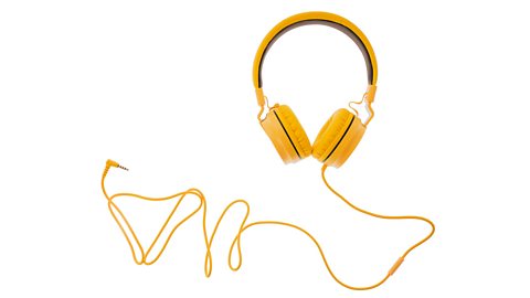 A pair of yellow headphones.