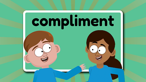 The word compliment above two children smiling at each other.