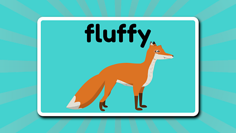 A golden fox beneath the word' fluffy'