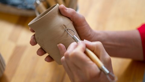 Marking a clay vase