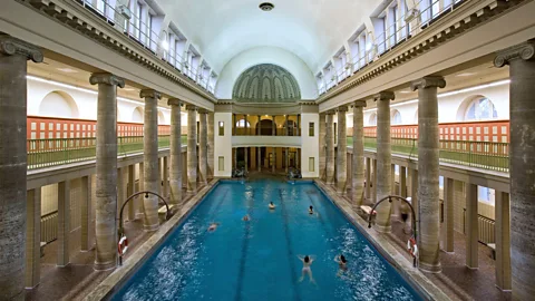 Photo of people swimming in Stadtbad Neukölln pool