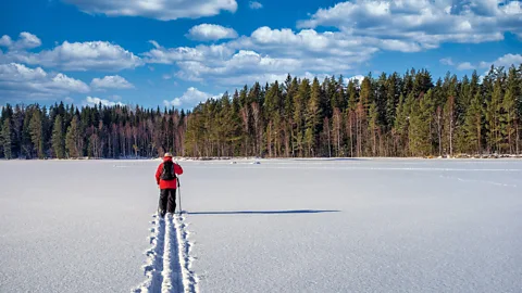 A person skiing by themselves in Sweden