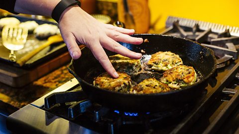 Getty Images "Bubble and squeak" potato patties fry in a pan (Credit: Getty Images)