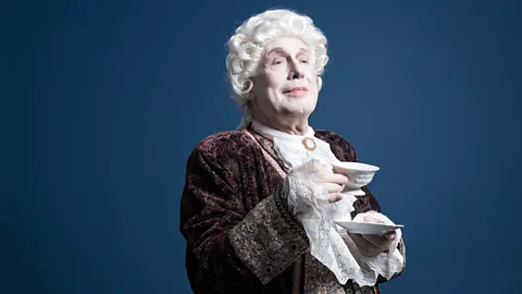 Man in Georgian dress drinking tea (Credit: Getty Images)