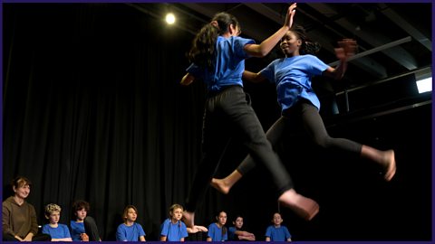 Two Year 8 students dancing during a school dance session