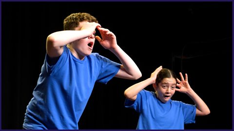 Two Year 8 pupils showing dramatic facial gestures