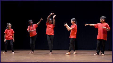 A group of five Year 7 pupils performing their dance on the theme 'Shape Shifters'