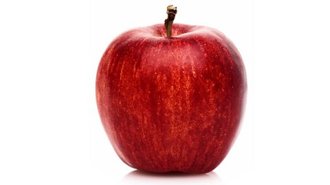 A red apple on a white background