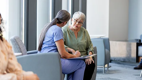 Nurse consoles patient