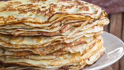 A stack of pancakes on a plate