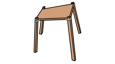 An imperfect and scrappy wooden stool. The legs are uneven and are held on with tape.