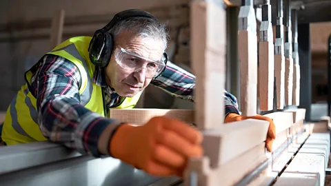 Older man working on carpentry project