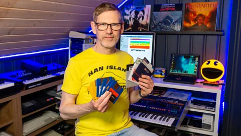 Espen Craft holding some of his floppy disk collection (Credit: Espen Kraft)