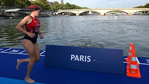 Athlete on diving platform in the Seine (Credit: Getty Images)