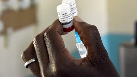 A health worker preparing a malaria vaccination in Kenya (Credit: Getty Images)