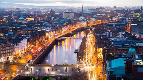View over OConnell Bridge and Dublin at night (Credit: Getty Images)